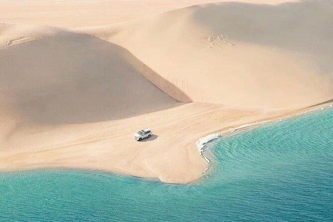 4hr Desert Safari: Sunset,Sunrise,Camel,Sand boarding,Inland Sea - The singing dunes provide a short pause