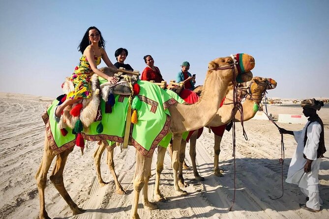 Camel trekking on the Dunes with Sunset - Why a sunset camel ride works so well in Qatar