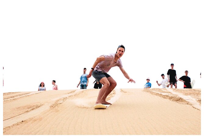 Desert Safari Combo: Camel Ride, Sandboarding & Inland Sea Visit - A brief camel ride at the desert gate