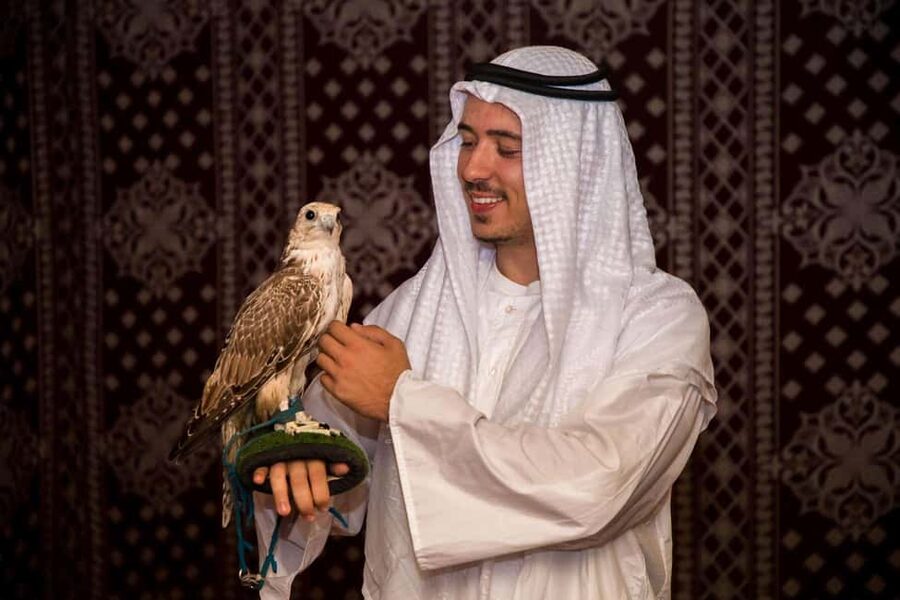 Desert Safari Dubai with Camel Ride, Sandboarding & Dinner - Sandboarding tests your balance