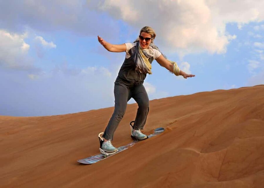 Desert Safari Dubai with Camel Ride, Sandboarding & Dinner - Al Aweer camp brings the evening together