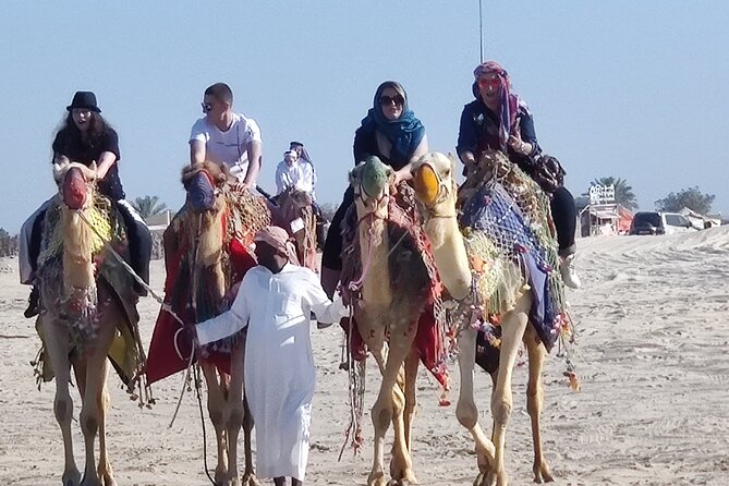 Desert Safari, Quad Bike, Sandboarding and Camel Ride - What the guides add to the day