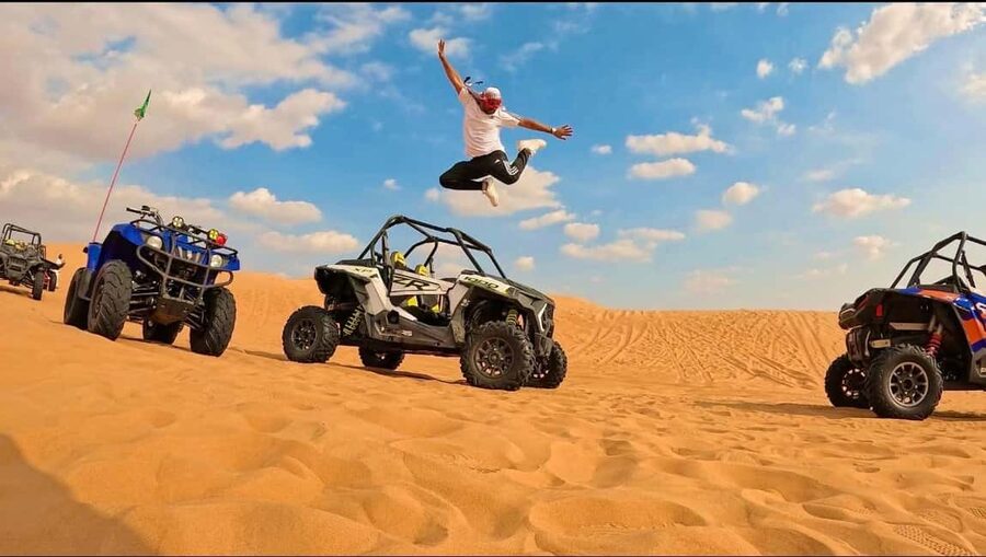 Desert Safari, QuadBike,Dune buggy, Sandboarding & CamelRide - The Inland Sea and the Saudi border view
