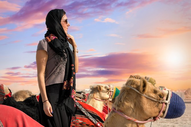 Desert Safari with Camel Ride, Sand Boarding & Inland Sea Tour in Doha - The camel stop is brief but photogenic