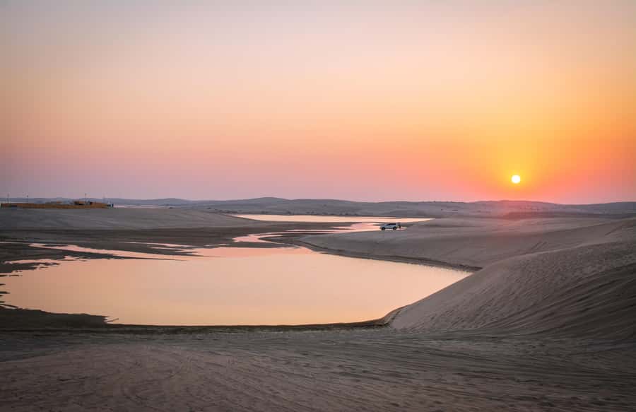 Doha Activities: Desert Safari, Dune Bashing & Inland Sea - Dune bashing and sandboarding across the sandline dunes