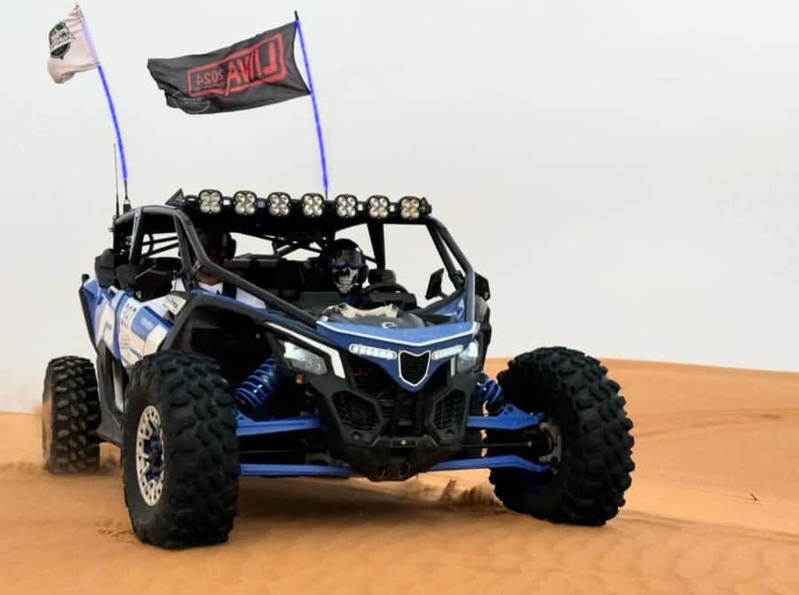 Doha: ATV Quad Bike and Buggy Desert Safari with Camel Ride - From Doha streets to open sand