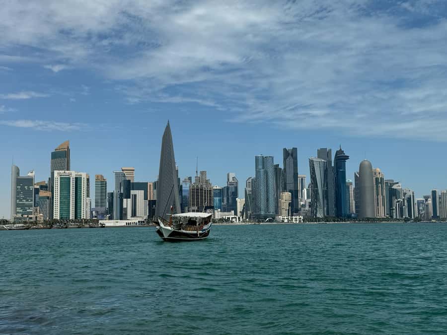 Doha City Sightseen and Dhow Boat Ride Tour (Private Tour) - West Bay towers from land and water