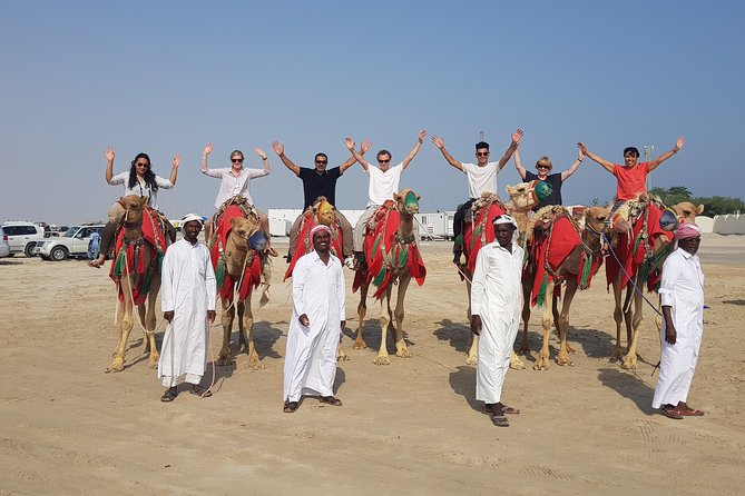 Doha: Combo City Tour & Desert Safari with Pickup drop-off - Trading city roads for the dunes at Sealine Beach