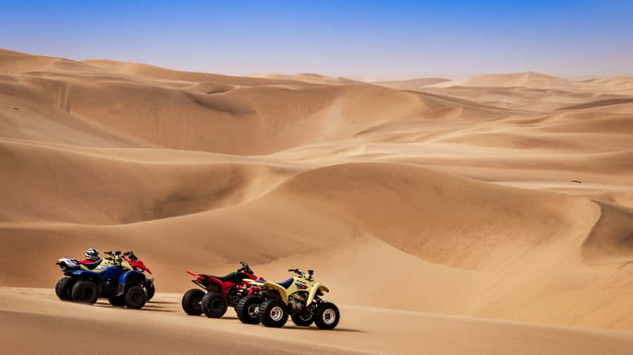 Doha: Combo Private Tour of Desert Safari with ATV Ride - Camel rides, falcon photos, and the extra-cost question
