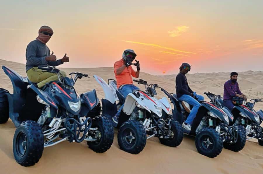 Doha: Desert All Activities ATV Quad Bike, Dune Bashing - Sandboarding on the dunes near Mesaieed