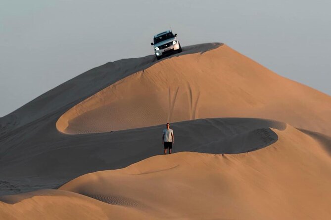 Doha: Desert Safari | Camel ride | Sand-boarding | Quad Biking - Khor Al Udeid, where dunes meet the sea