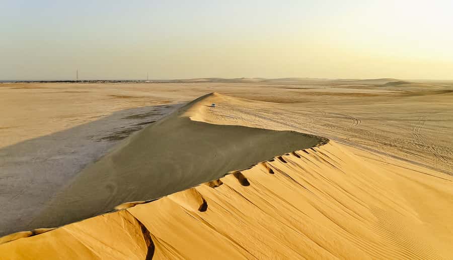 Doha: Desert Safari, Dune Bashing, Sandboarding, Camel Ride - Leaving Doha for open sand