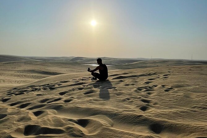 Doha: Desert Safari, Sand Boarding, Camel Ride & Inland Sea Tour - Sandboarding is simple, active fun