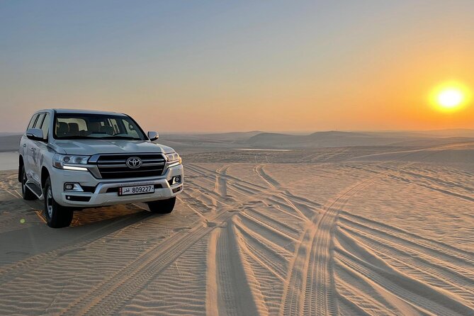 Doha: Desert Safari, Sand Boarding, Camel Ride & Inland Sea Tour - The guides can make or break the day