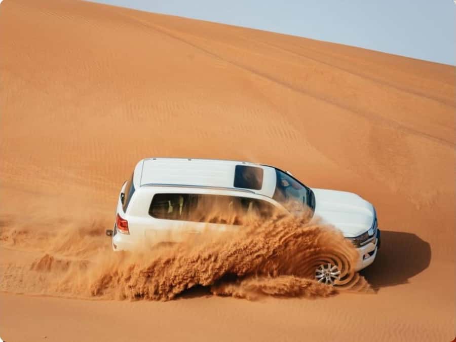 Doha:Desert Safari with Camel Ride, ATV Bike,& Sand Boarding - From Doha pickup to the Inland Sea