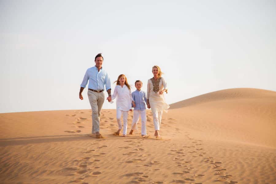 Doha: Desert Safari with Camel Ride Family Friendly Tour - Leaving Doha in a Land Cruiser