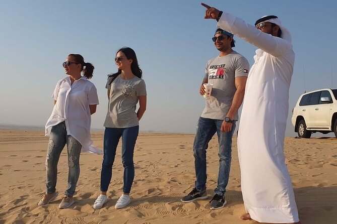 Doha Desert Safari with Camel Ride, Sand Boarding,Inland Sea Tour - From Doha’s old town toward Qatar’s oil country