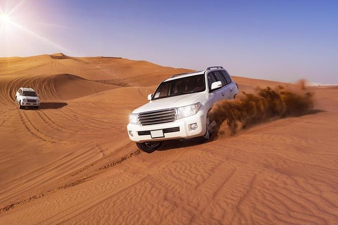 Doha: Desert Safari With Quad bike ,Camel Ride And Sand Boarding - Sunrise over the singing sand dunes