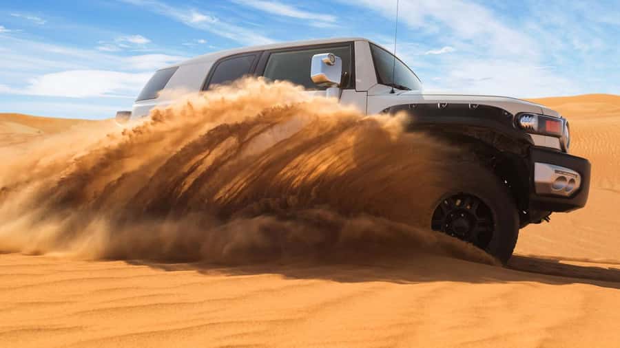 Doha: DesertSafari with Quad Bike, Camel Ride & Sandboarding - Khor Al Adaid, where desert meets sea