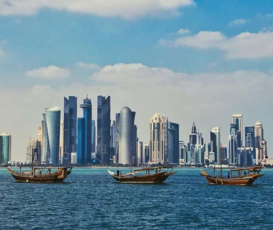 Doha: Dhow Cruise with Pickup, Drop-Off, Tea & Refreshments - Boarding the wooden dhow