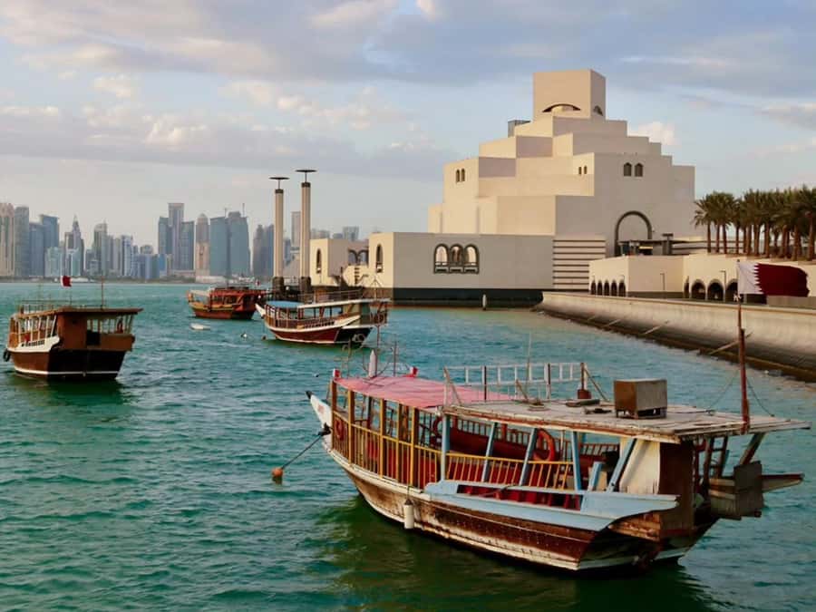 Doha: Guided City Tour With All Attractions, Pickup/Drop-Off - Strolling Porto Arabia at The Pearl-Qatar