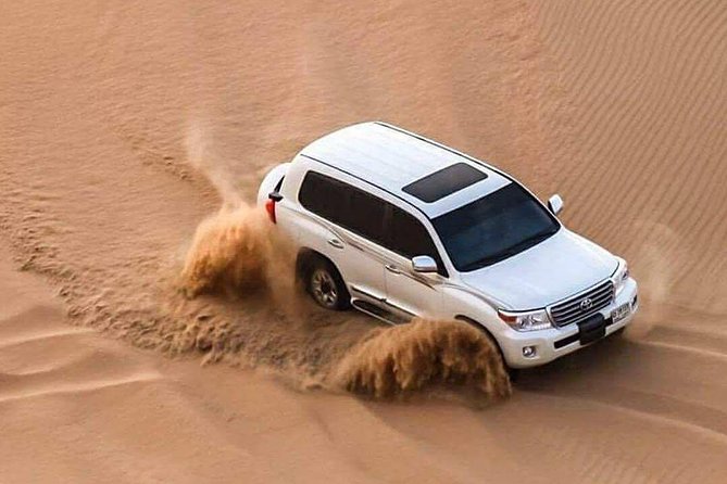 Doha :Half Day Desert Safari | Camel Riding | ATV | Sand Surfing - Leaving Doha for the Sealine coast