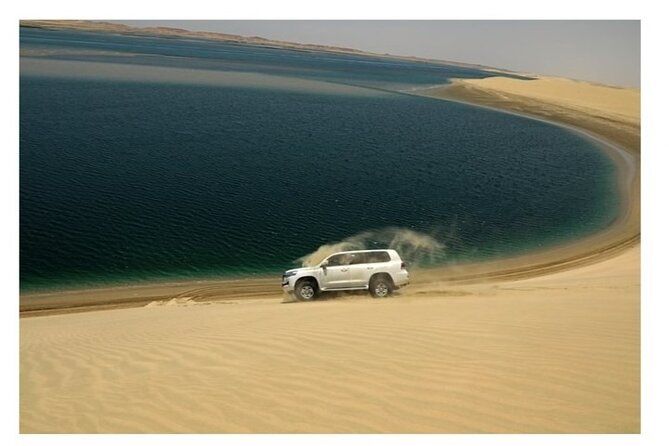 Doha Half Day Desert Safari Dune Bashing CamelRide & Sandboarding - Sunset views and the best photo stop