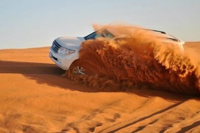 Doha Half Day Desert Safari with Camel Ride and Sand Boarding - Sandboarding on the Dunes