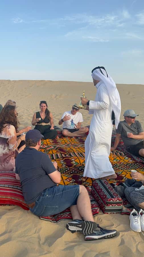 Doha: inland sea Tour With Dune Bashing &Sandboarding fun - The camel ride: authentic, but brief