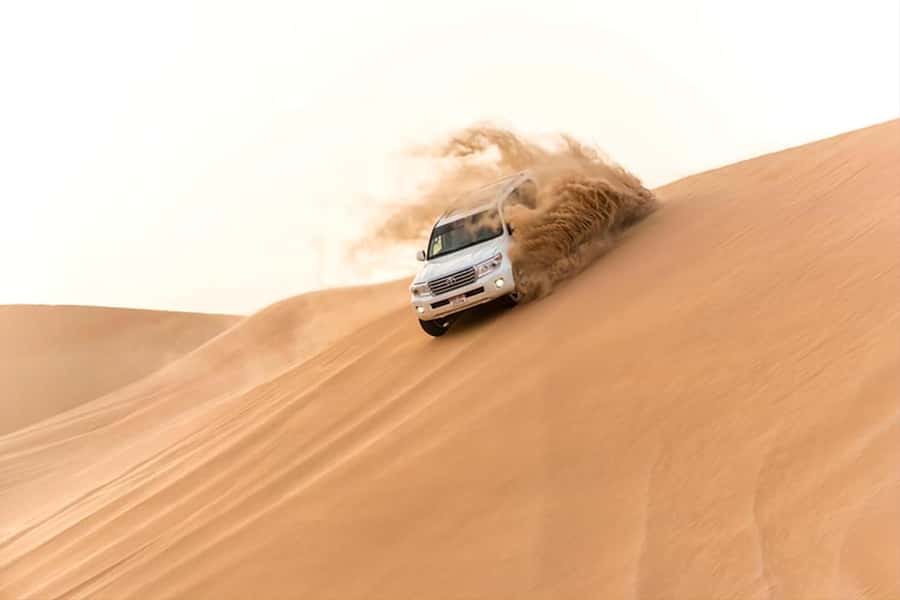 Doha: inland sea Tour With Dune Bashing &Sandboarding fun - Two hours of dune bashing