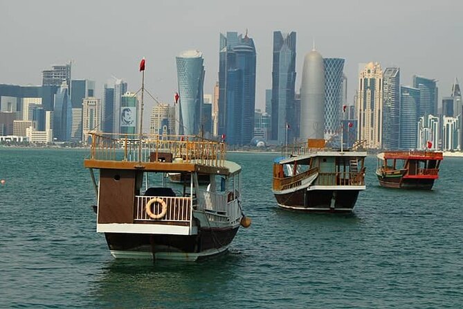 Doha Layover City Tour And Dhow Boat Ride - Guides, vehicles, and the private-tour advantage