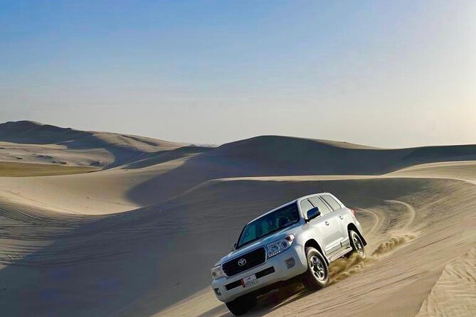 Doha Layover Desert Safari, Camel Ride, Sand Boarding, Inland Sea - Booking, weather, and cancellation details