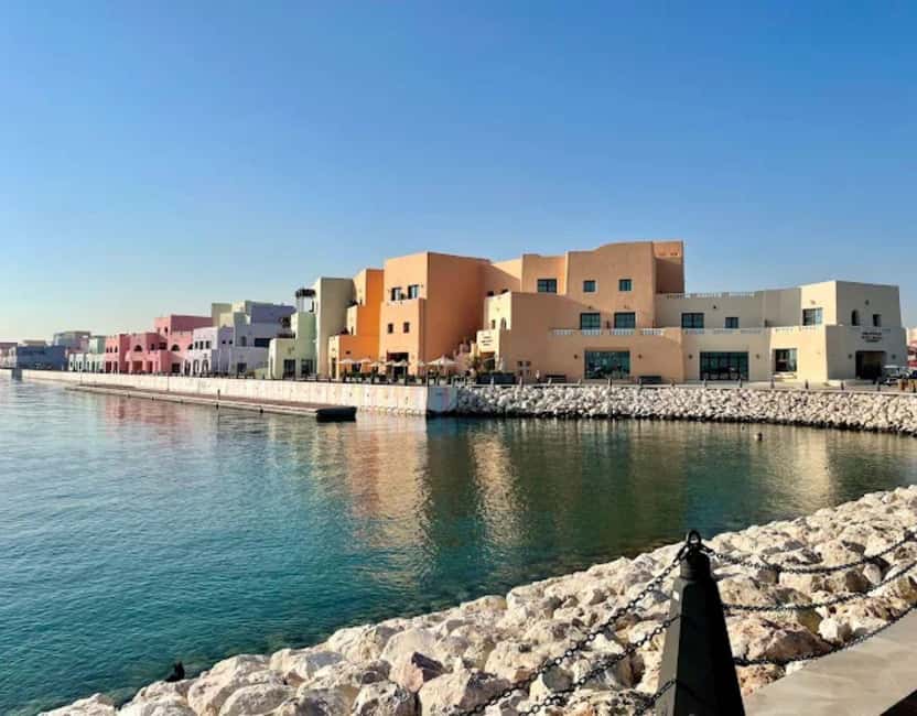 Doha: Mina District's Colorful Streets & Coastal Vibes Tour - What Mina District Adds to a Doha Visit