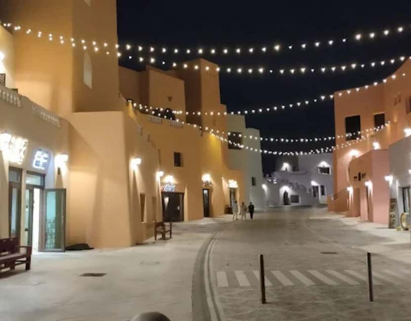 Doha: Mina District's Colorful Streets & Coastal Vibes Tour - Marina Views, Fishing Boats, and Sea Air