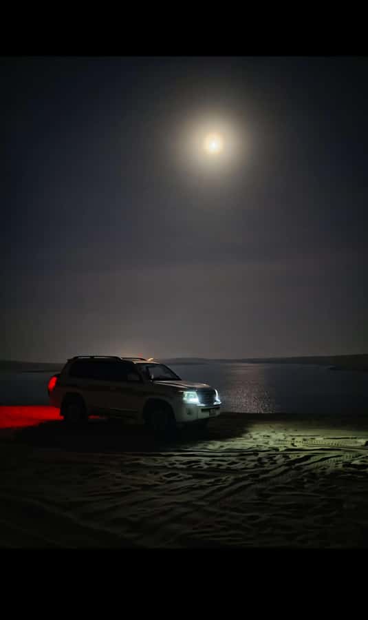 Doha: Night DesertSafari DuneBashing Sandboarding CamelRide - Leaving Doha for the night desert