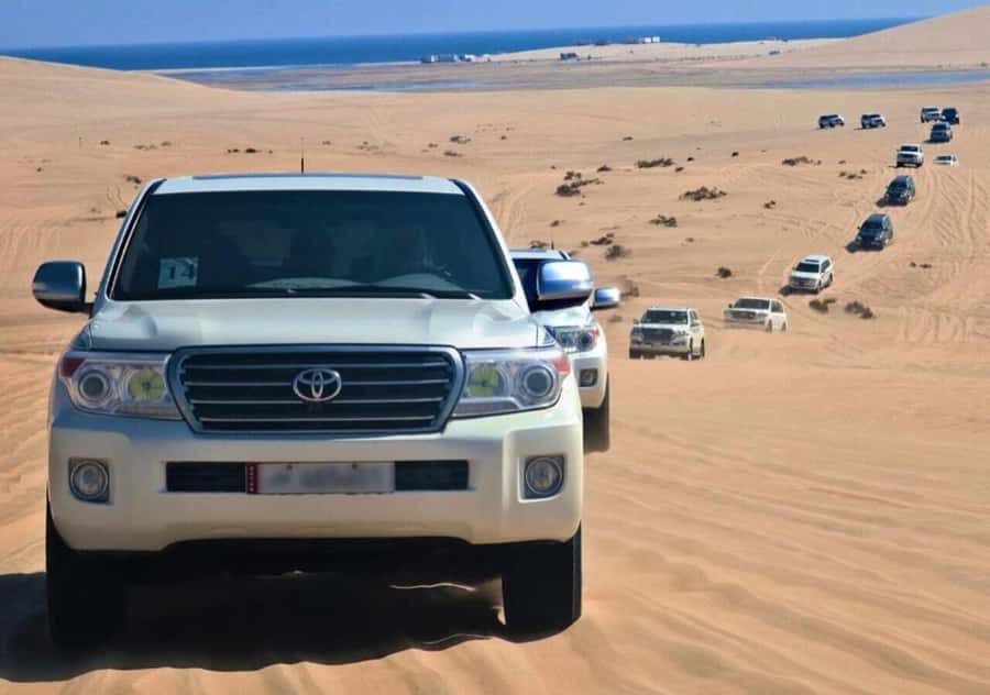 Doha: Overnight Desert Camping With BBQ Dinner & Breakfast - Sealine Beach and the first dunes