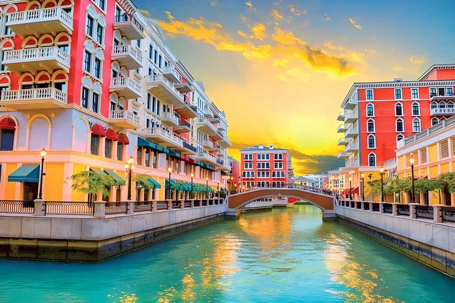 Doha: Pearl & Gewan Islands Food & Boat Tour with 7 Tastings - Qanat Quartier: pastel canals and the first Shawarma