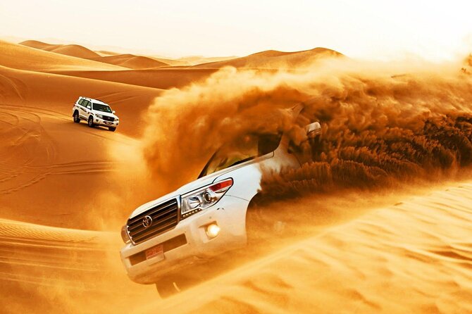 Doha Private Half-Day Guided Desert Safari Tour - Dune driving with a guide who knows the tracks