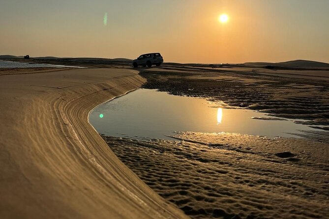 Doha-Private Half Day Safari Camel Ride and Sandboard included - Bedouin touches, tea, and water