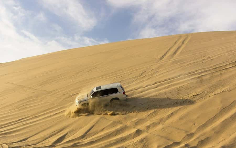 Doha: Private NIGHT desert safari with free camel ride - Finding the quietest part of the desert