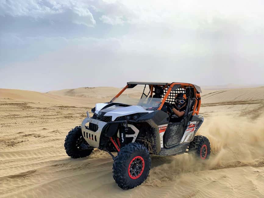 Doha Qatar Buggy ride, camel ride, dune bashing, sandboard. - SUV dune bashing across the Sealine dunes