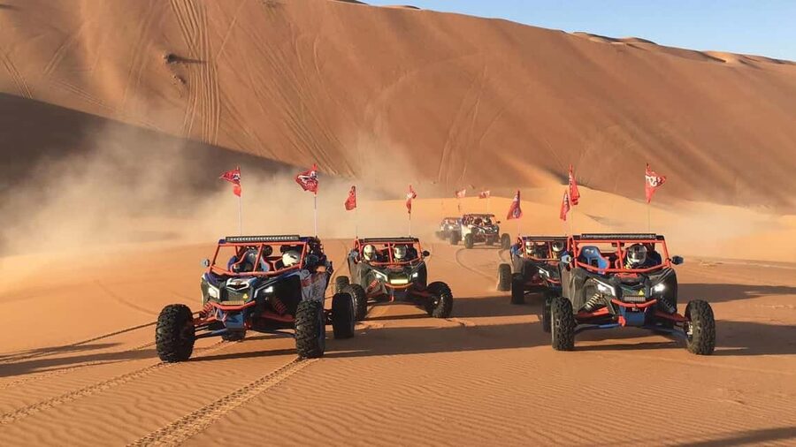 Doha Qatar Buggy ride, camel ride, dune bashing, sandboard. - Taking the wheel in a 1000cc dune buggy