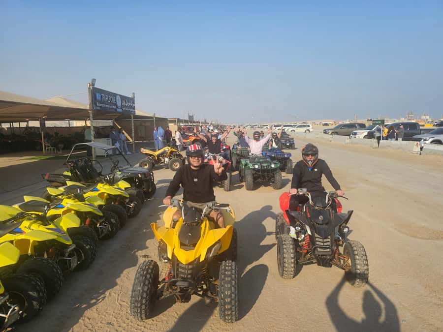 Doha: Quad Bike, Desert Safari, Buggy ride & inland sea tour - Quad biking on marked desert tracks