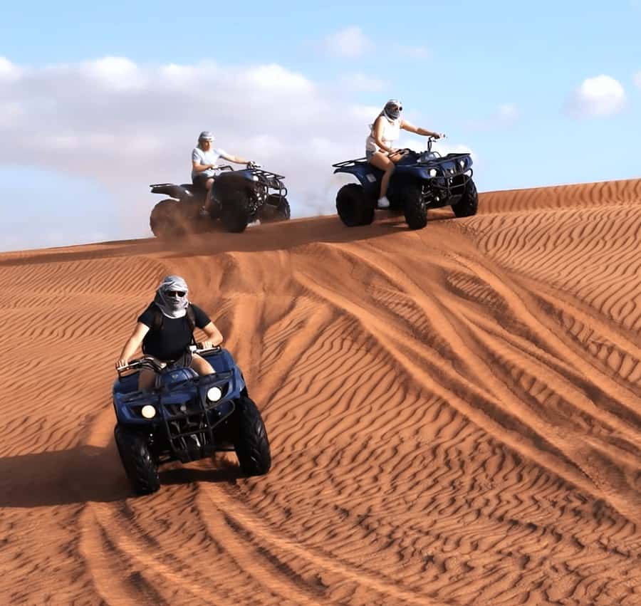 Doha Safari: ATV Ride, Dune Bashing, & Sandboarding Fun - Sandboarding with a ten-minute workout