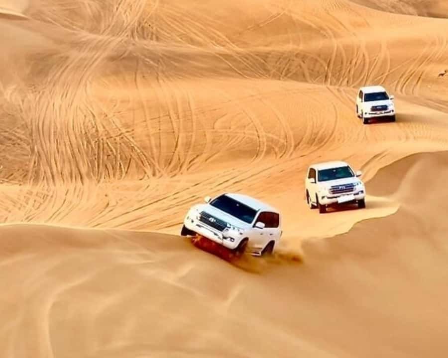 Doha: Safari ATV Ride Dunes Bashing and Camel Ride - Leaving Doha by Jeep or SUV