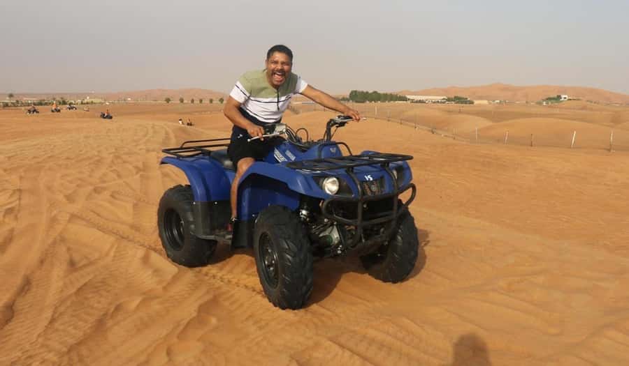 Doha Safari Quadbike, CamelRide, Sandboarding & Inland Sea - Dune bashing across the sand hills