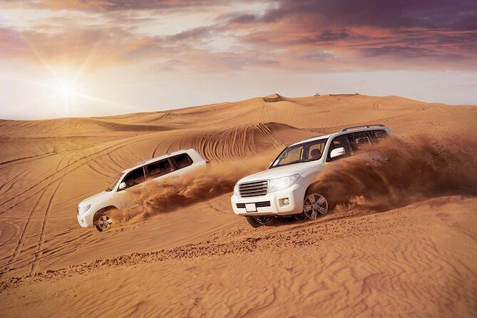 Doha Sharing Desert Safari with Dune Bashing and Sand Boarding - Dune bashing across the golden sand