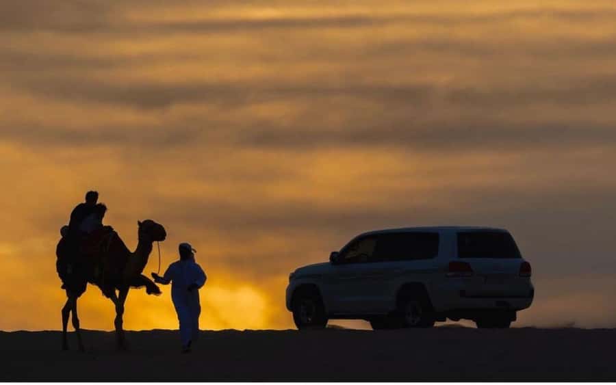 Doha: Stargazing Desert Safari w/ Dune Bashing & Camel Ride - Leaving Doha for the open desert