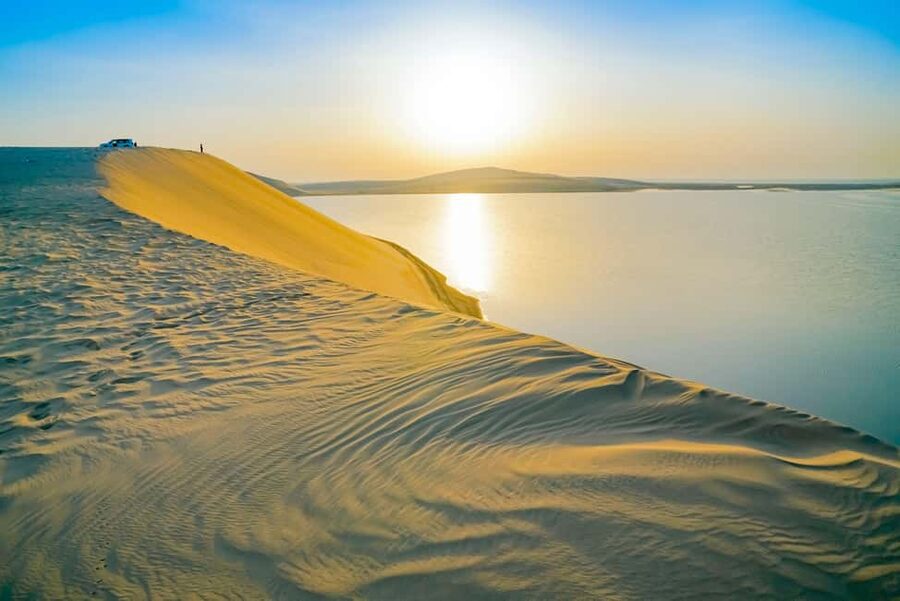 Doha: Sunset Desert Safari, ATV, Camel Ride and Sandboarding - Optional quad biking adds another motorized thrill