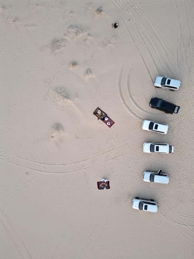Doha: Sunset Desert Safari with Camel Ride and Sandboarding - The return to Doha and what the timing means